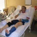 John Force on his phone in the Hospital