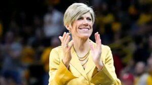 Iowa Hawkeyes bracketology update with Ava Heiden shooting a free throw during a Big Ten game.