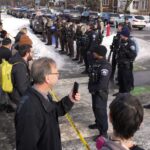 minneapolis-protesters-line-rt-jt-260107_1767822306766_hpMain_2