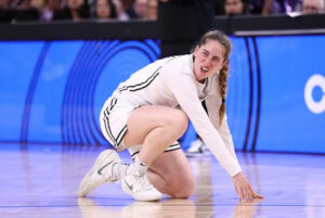 Kate Martin ankle injury during Golden State Valkyries pre-game introductions