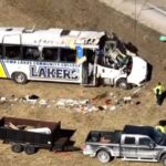 Iowa Lakes baseball bus crash investigation scene with emergency responders