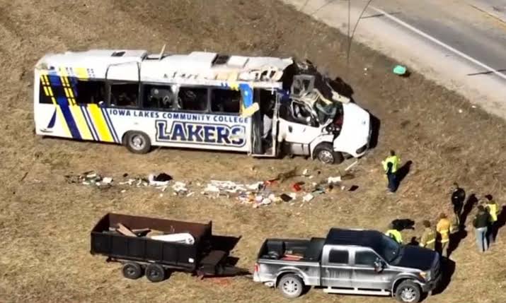 Iowa Lakes baseball bus crash investigation scene with emergency responders