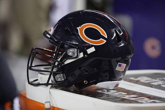 Chicago Bears players during game as Iowa NFL team move bill gains momentum